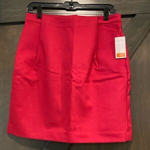 Red knit pleated from mini skirt. Size 6. Brand new.